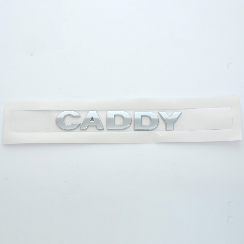 Емблема - напис "CADDY" 2004-2011 скотч 160х25 мм ( 2KO 853 687 739)