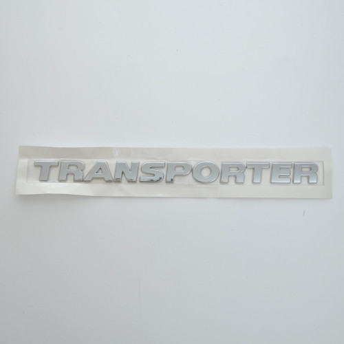 Емблема - напис "TRANSPORTER" (T6) скотч 320x25 мм 2012- (wiwo 7EO 853 687 739)