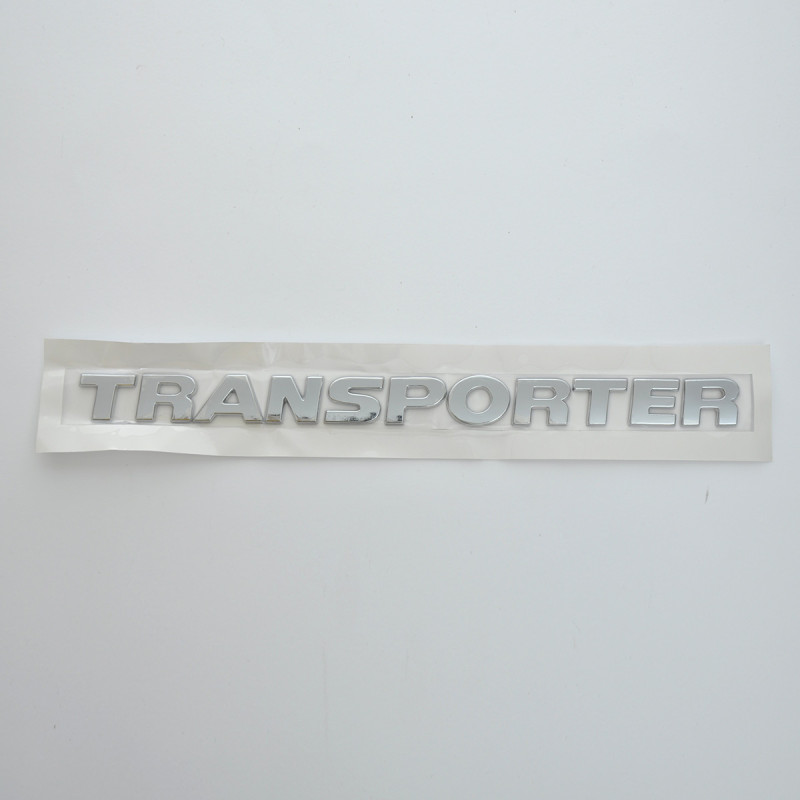 Емблема - напис "TRANSPORTER" (T6) скотч 320x25 мм 2012- (wiwo 7EO 853 687 739)